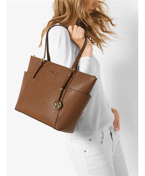 michael michael kors jet set east west top zip tote|Michael Kors saffiano tote.